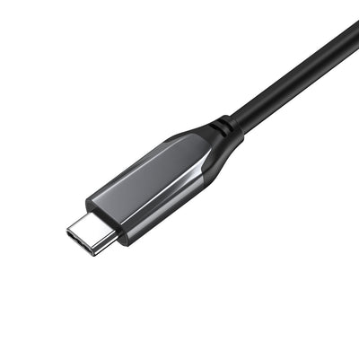 UPTab USB-C to HDMI 2.1 HDR Active Adapter connected to a laptop and displaying content on an 8K resolution monitor.